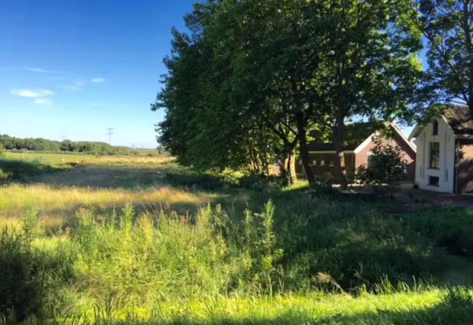 The farm seen from the fields